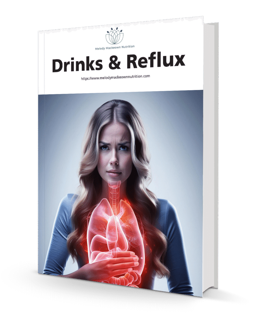 Melody Mackeown Nutrition eBook Image for Digestive Health Support. The eBook Title is Fix your Digestion Naturally and contains a coconut with strawberries cut up inside of the coconut