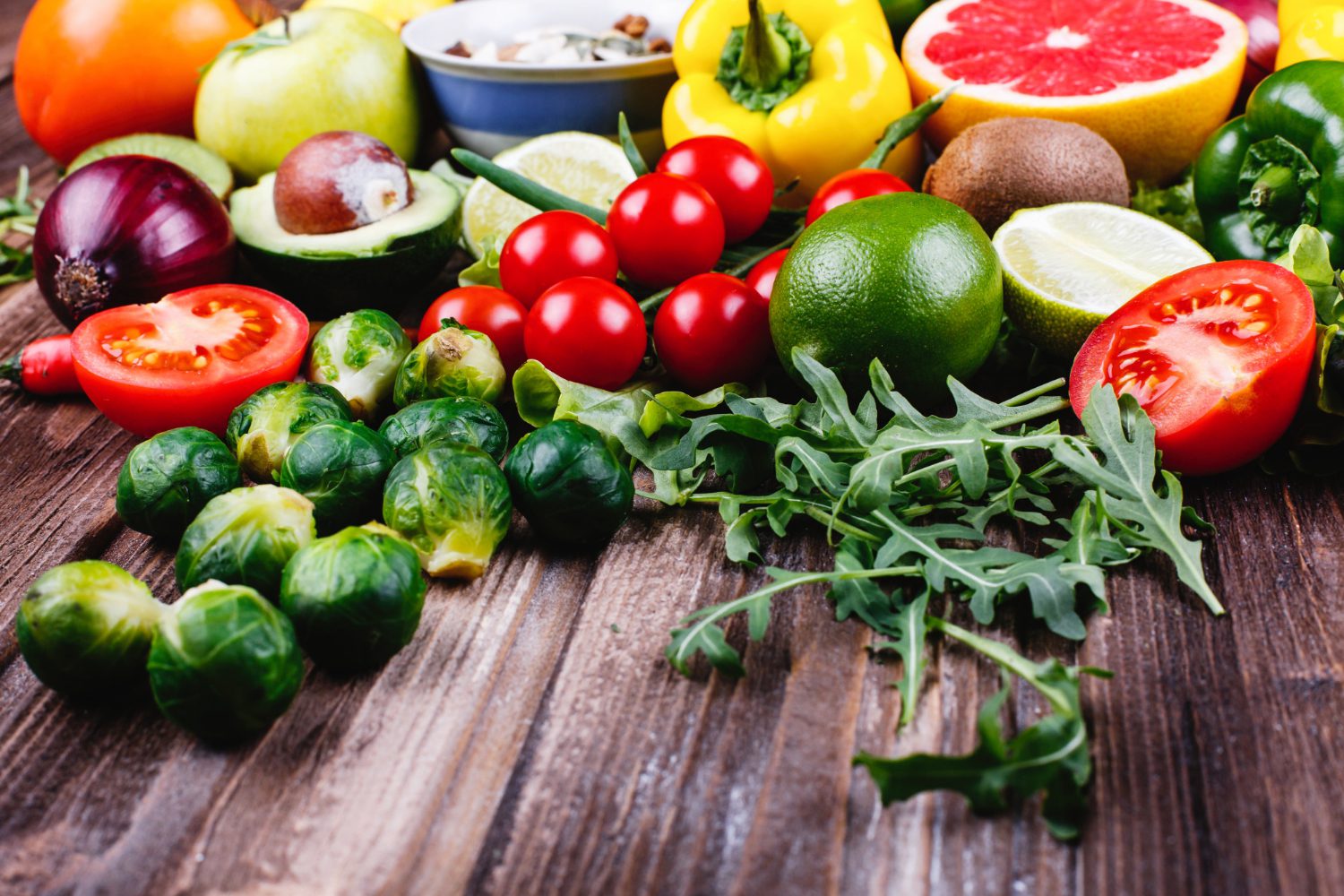 Colorful vegetables, olive oil, fish, and whole grains.