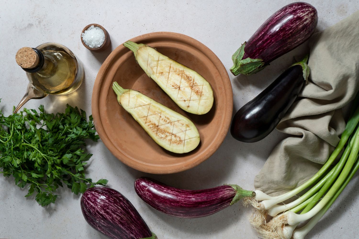 High Histamine Foods and What to Know Before You Restrict Your Diet A bright kitchen scene with fresh low histamine ingredients, such as rice, courgette, carrots, herbs and fresh protein.